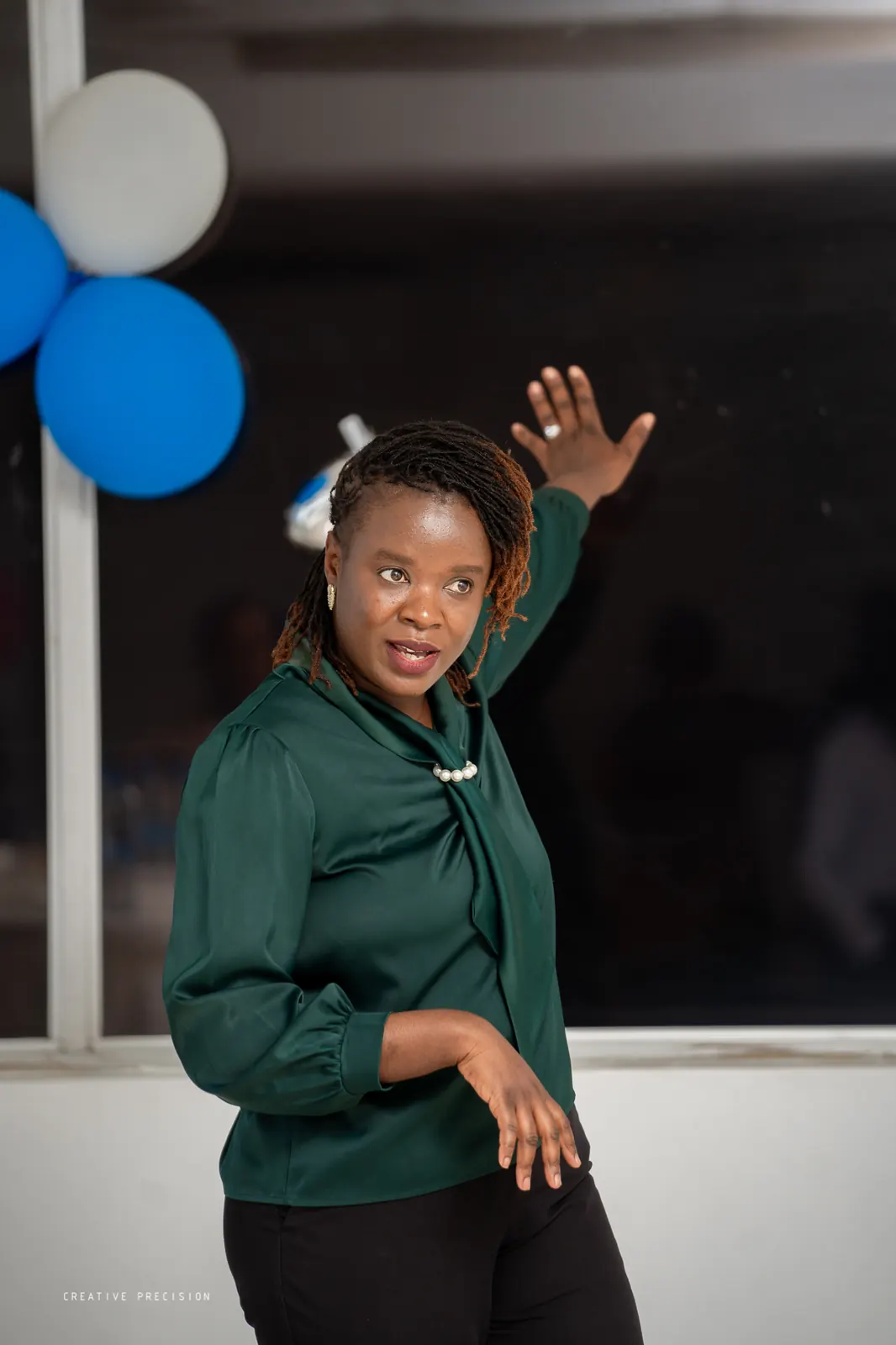 A colleague addressing the team