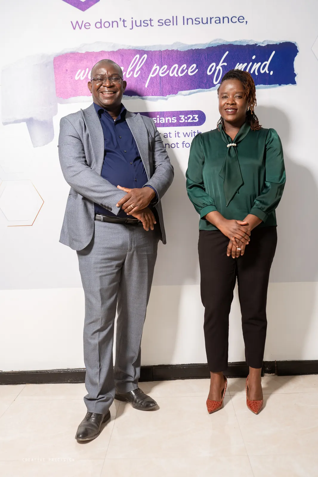 Directors at the Symmetric brand wall